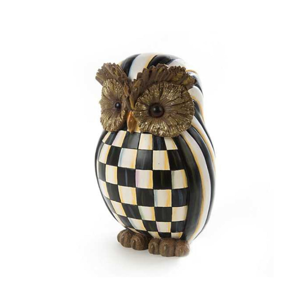 Decorative owl figurine with black and white checkered pattern on a white background