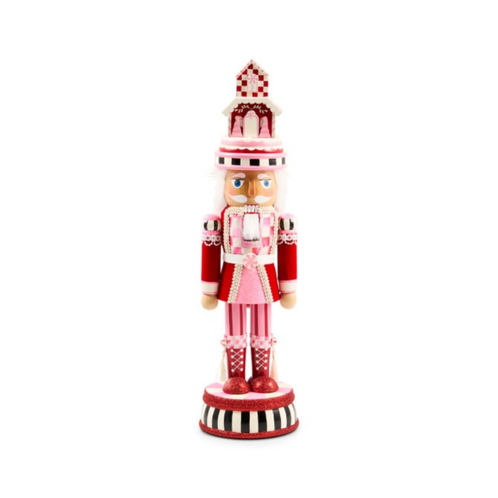 Ruby Red Wood Nutcracker on a white backround. 
