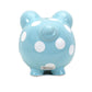 Blue piggy bank with white polka dots on a white background