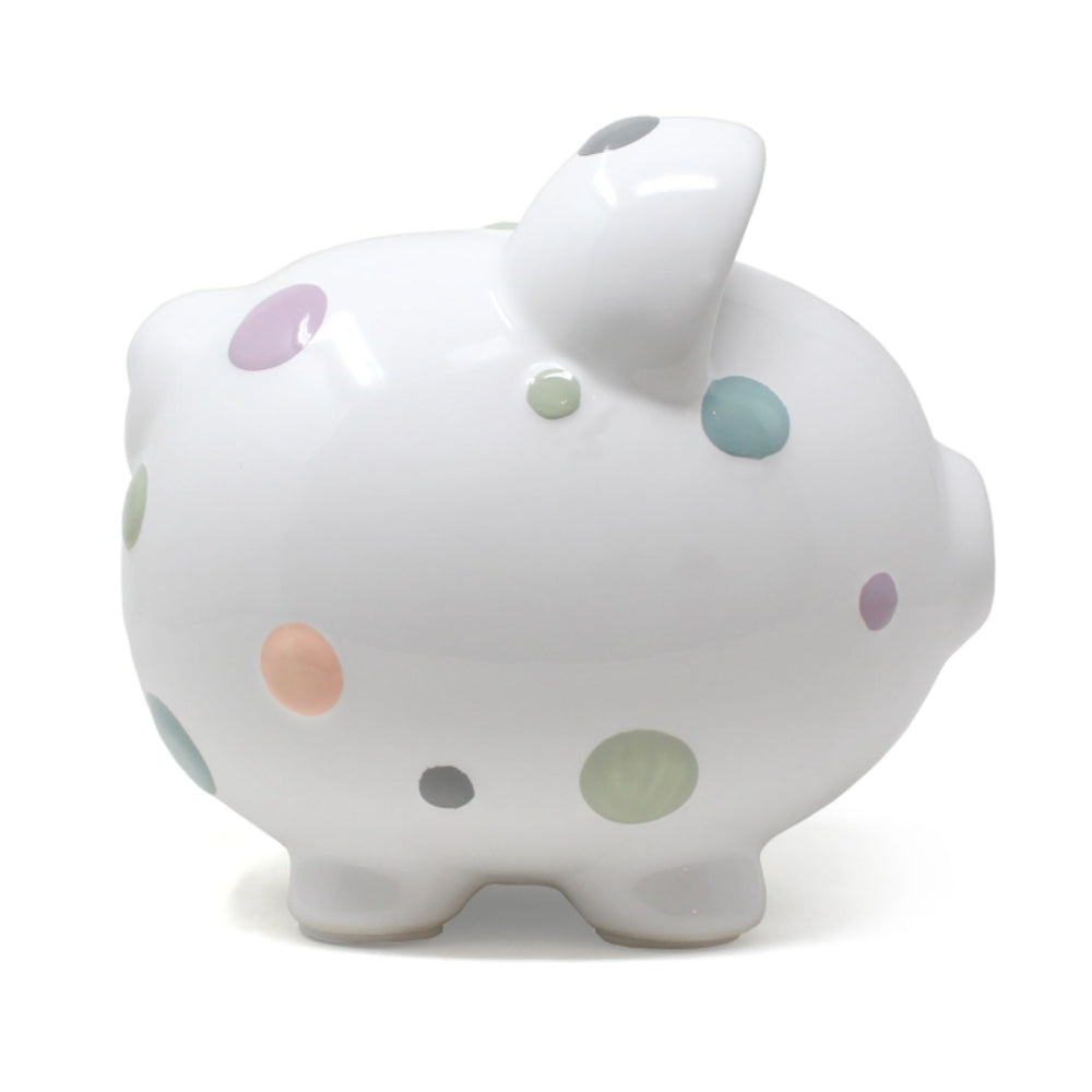 Right side photo of a white piggy bank with colorful polka dots on a white background