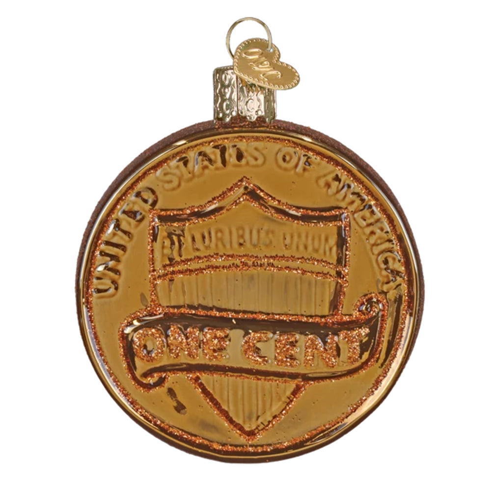 Gold-colored coin-shaped ornament with 'United States of America' and 'One Cent' text on a white background