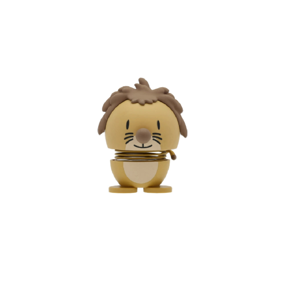 Tan lion shaped figurine with a spring on a white background