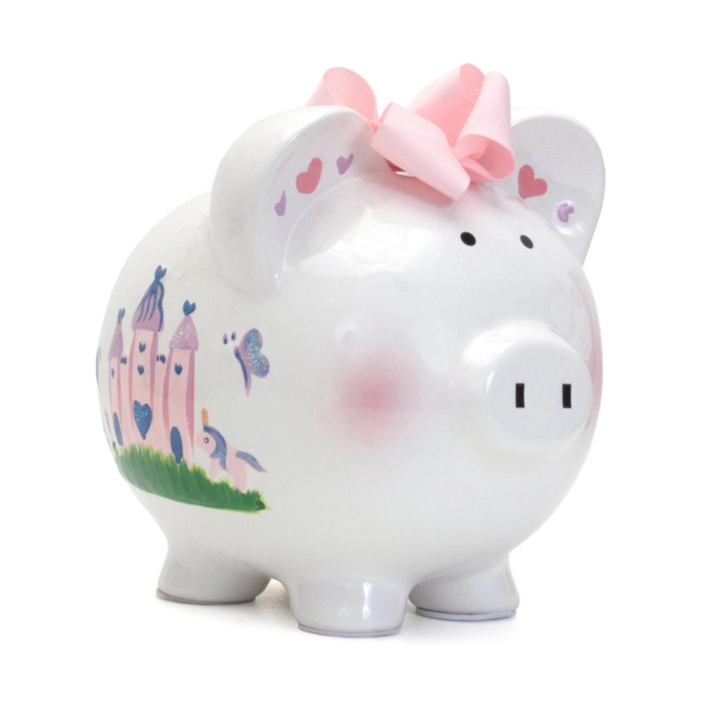 A Princess Castle Piggy Bank with a castle, butterflies, hearts, and a pink bow on a white background.