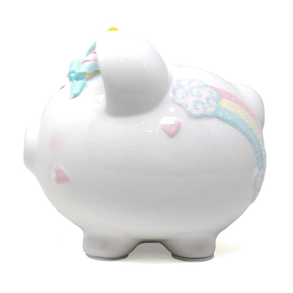 White piggy bank with colorful decorations on a white background