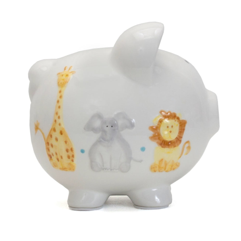 White piggy bank with giraffe, elephant, and lion designs on white background. 