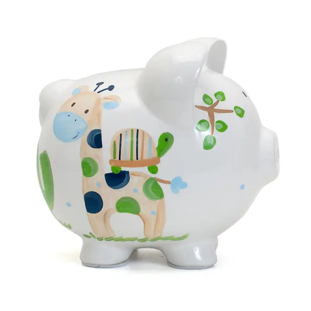 Right side photo of a white piggy bank with colorful designs on a white background