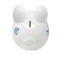 White piggy bank with blue sailboats on a white background