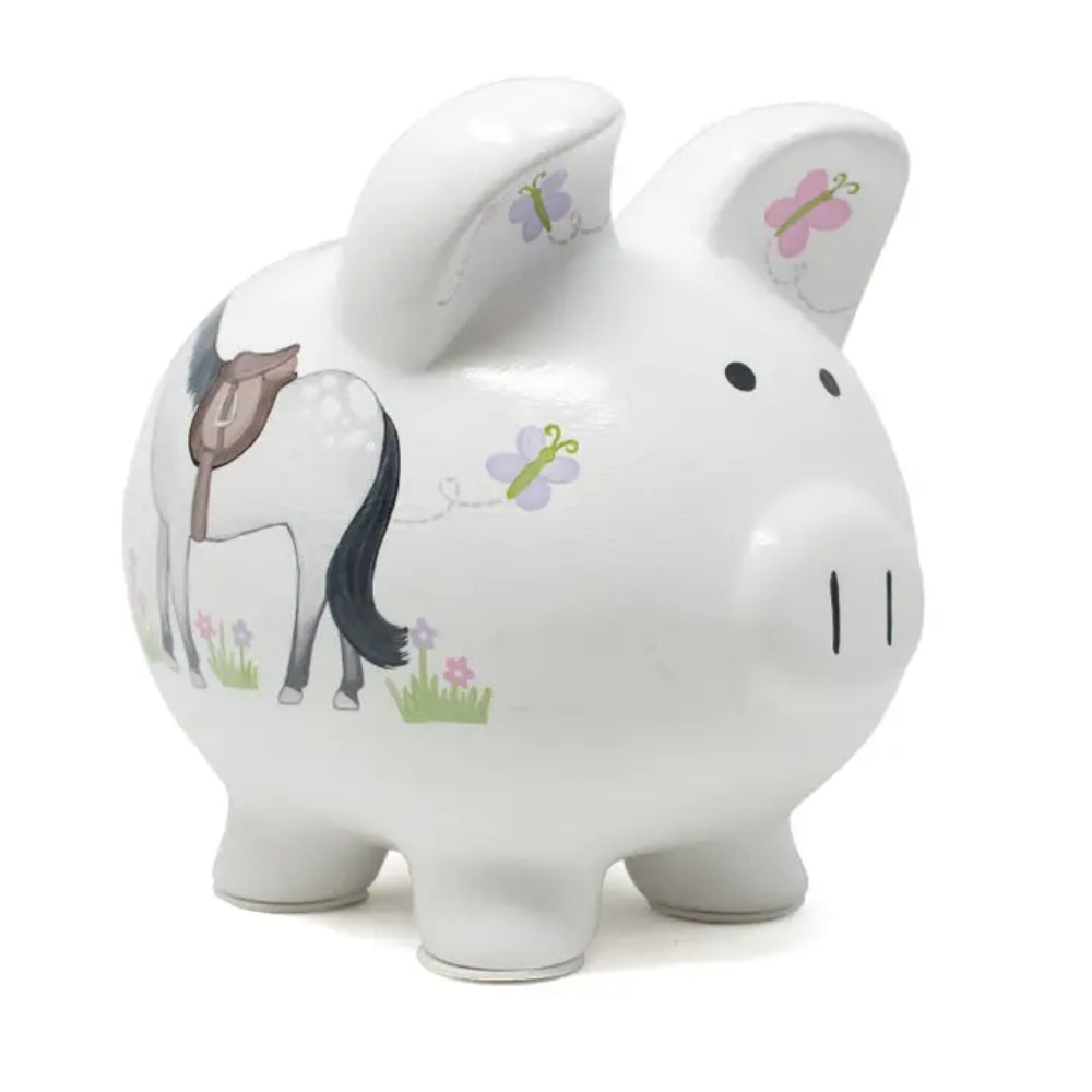 White piggy bank with horse and butterfly design on a white background