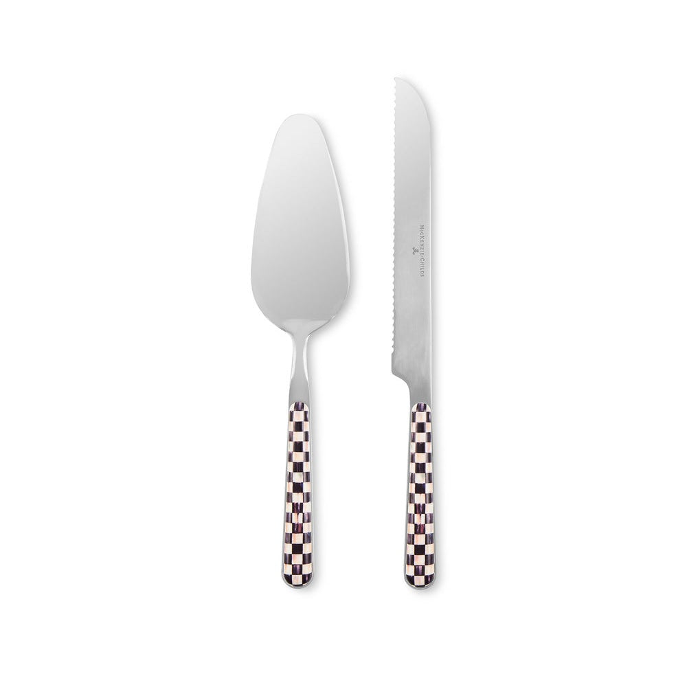 A two-piece serving utensil set consisting of a pie server and a dinner knife, both with polished silver stainless steel blades and handles featuring a pink and white checkered pattern, shown on a plain white background.