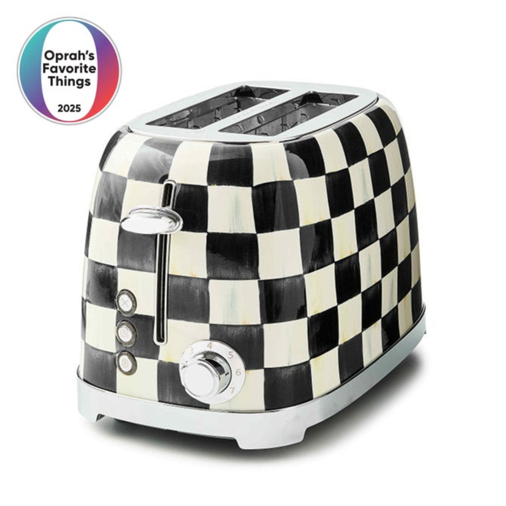 A two-slot toaster with a black and white checkerboard pattern, featuring chrome accents and a round control dial. A circular 'Oprah's Favorite Things 2025' badge is shown in the top-left corner on a plain white background.