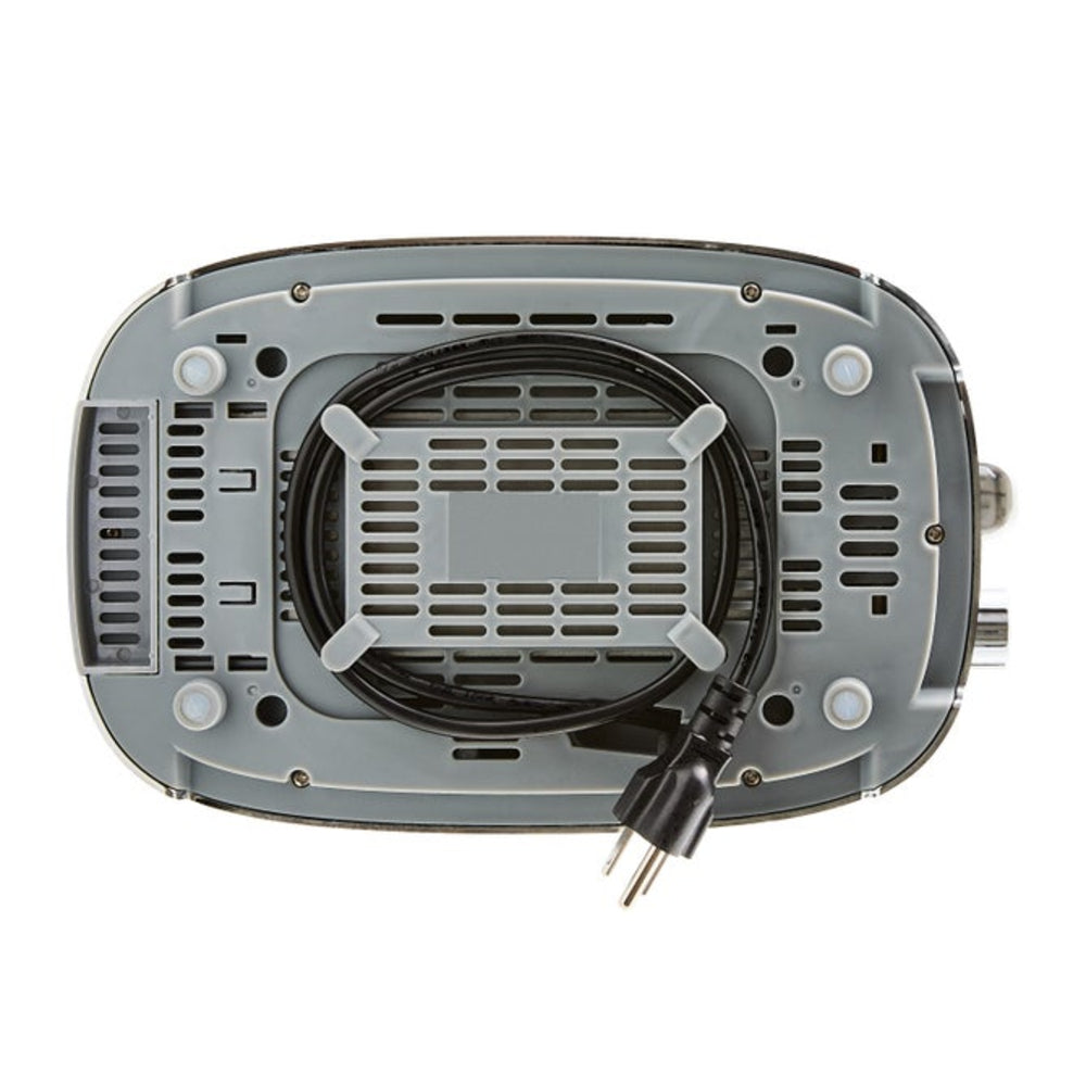 The underside of a gray countertop appliance, showing ventilation slots, a coiled black power cord, and a two-prong plug, photographed on a white background.