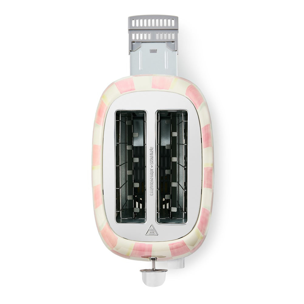 Toaster with a decorative pink and white checkered pattern on a white background
