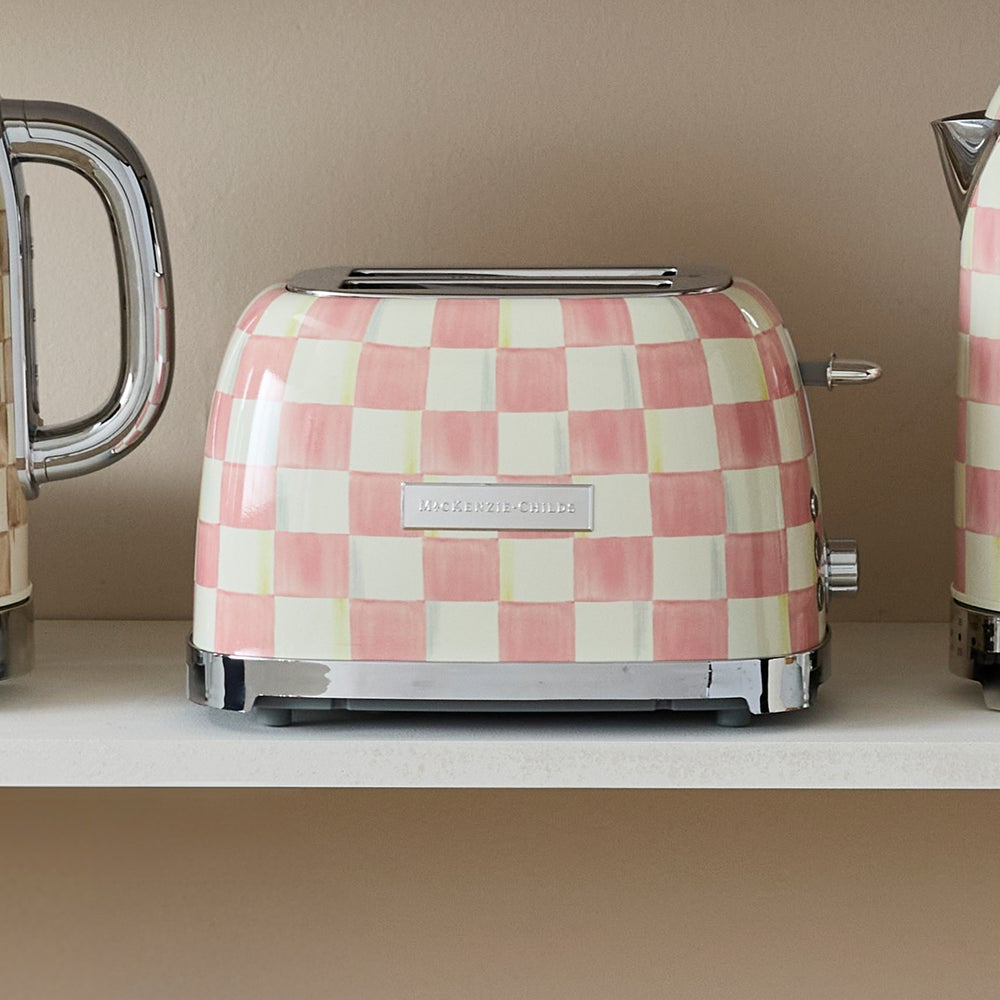 Checkered toaster on a kitchen counter with a neutral background