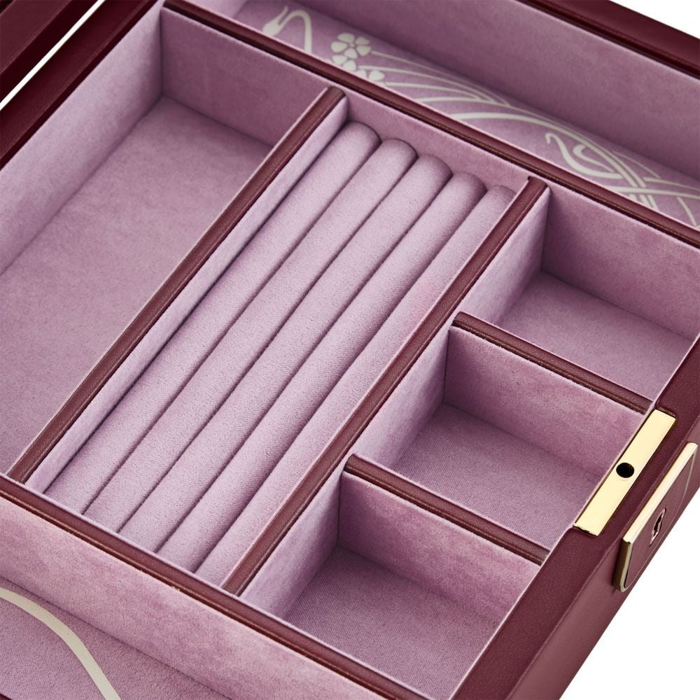 Pink jewelry box with compartments for storing jewelry