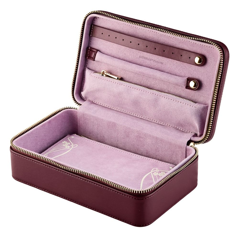 Blue jewelry case with open lid on a white background