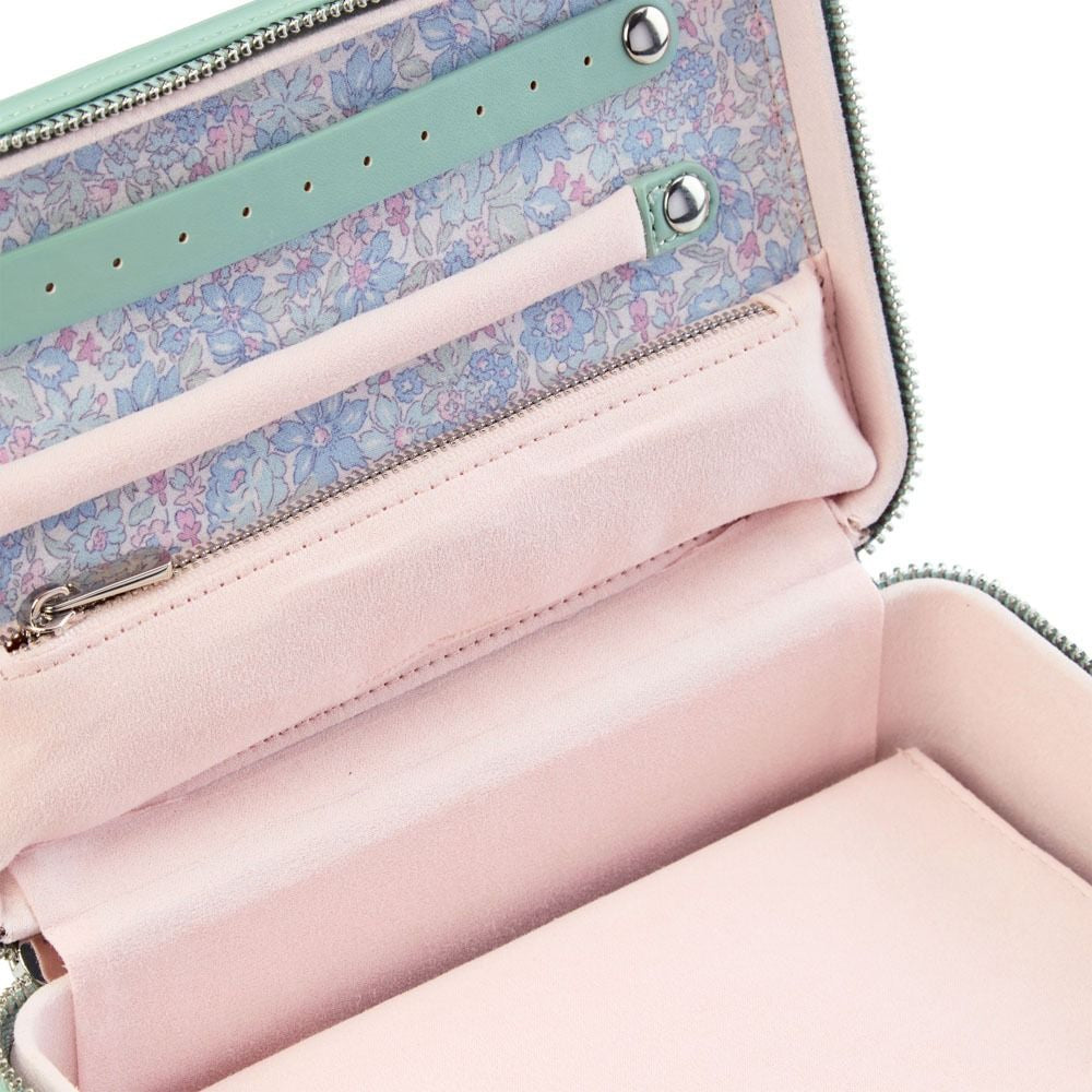 Pink wallet with floral patterned interior on a white background