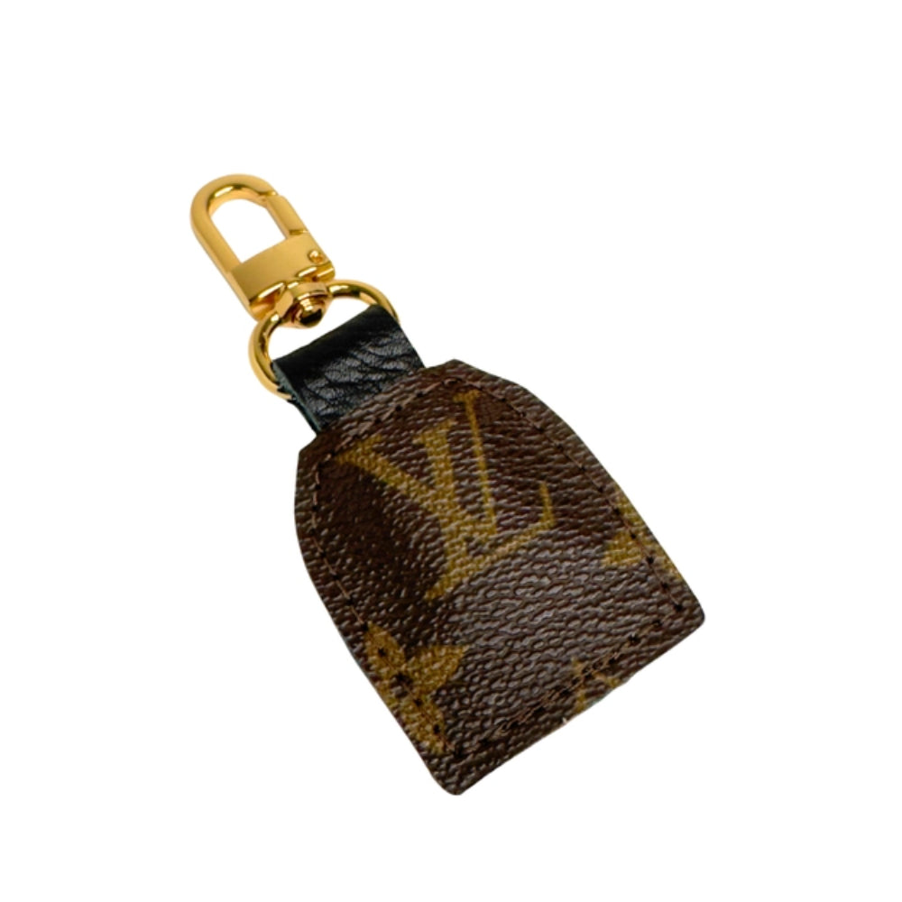 Louis Vuitton keychain with monogram pattern on a white background