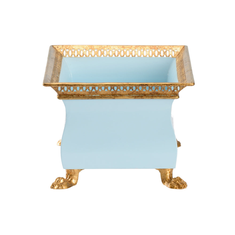 A small blue lacquered iron planter with antique gold gallery and decorative feet.