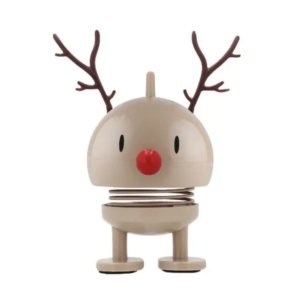 A Christmas-themed spring toy shaped like a reindeer, featuring a beige body, brown antlers, a red nose, and black eyes, set against a plain white background.