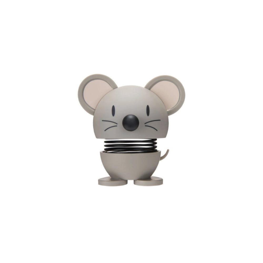 Grey mouse  shaped figurine with a spring on a white background