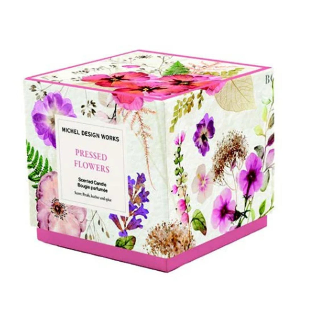 Cube-shaped product packaging with floral design and 'Michel Design Works' branding