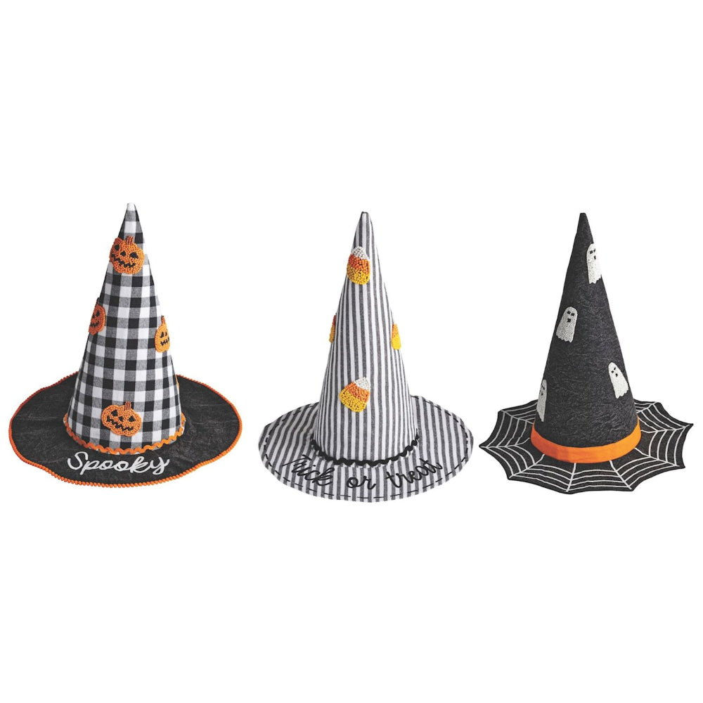 Three Halloween-themed witch hats on a white background