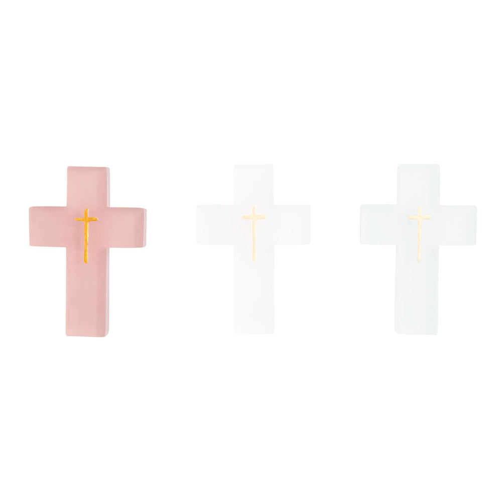 Pink resin wall cross with gold cross in the center on a white backround.