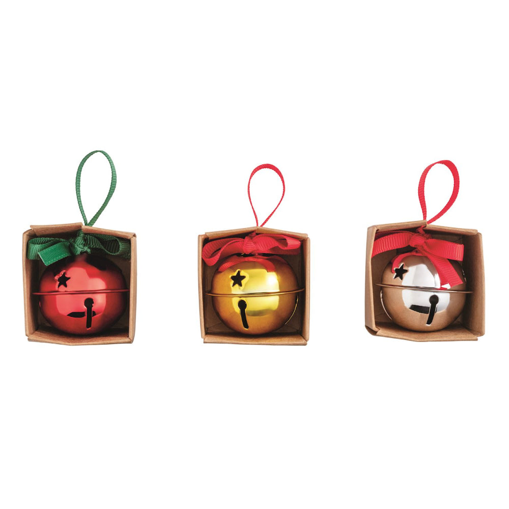Three metallic jingle bells in decorative boxes with ribbons on a white background