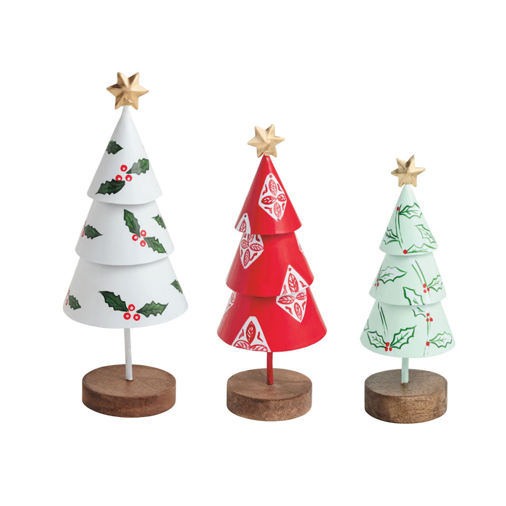 Three decorative Christmas trees with wooden bases on a white background