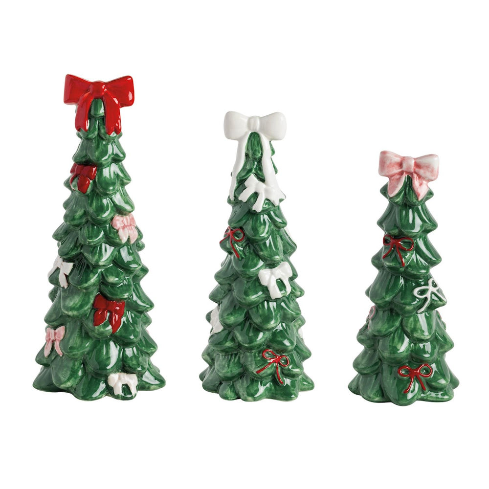 Three decorative Christmas tree figurines with colorful bows on a white background.