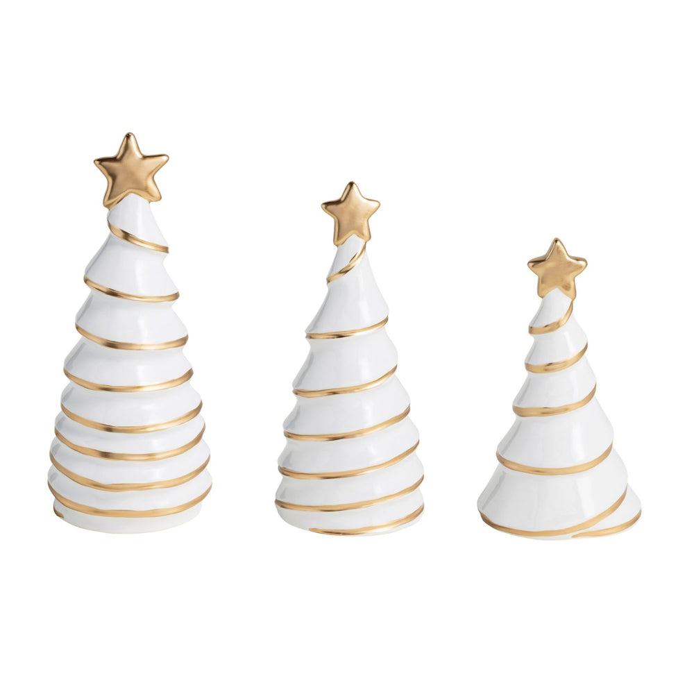 Three white ceramic Christmas trees with gold accents and stars on a white background.