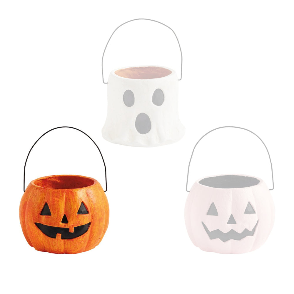 Three Halloween-themed buckets with jack-o'-lantern faces on a white background