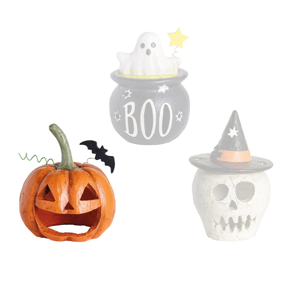 Halloween-themed decorative items including a pumpkin, ghost, and skull on a white background.