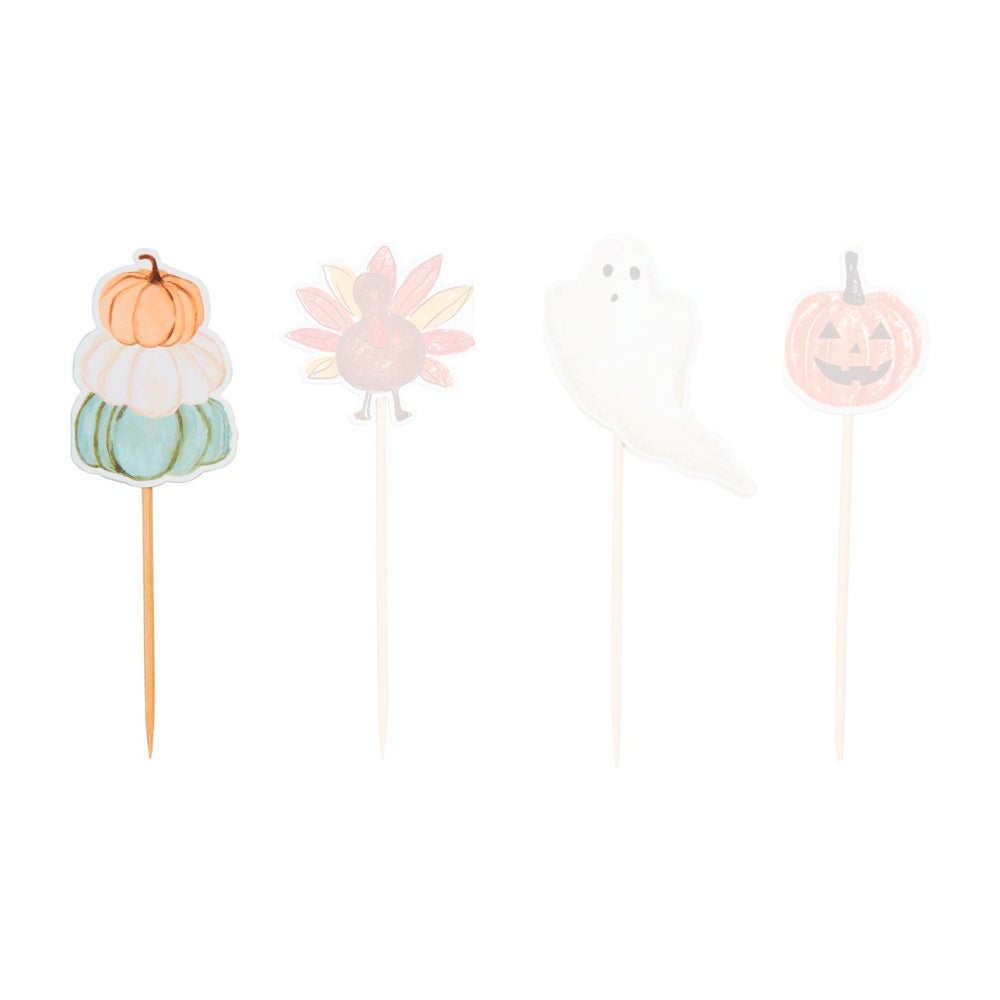 Stacked pumpkin halloween-themed  thoothpick sets of 24 with a orange, white and green stacked pumpkins paper design on a toothpick on a white backround. 