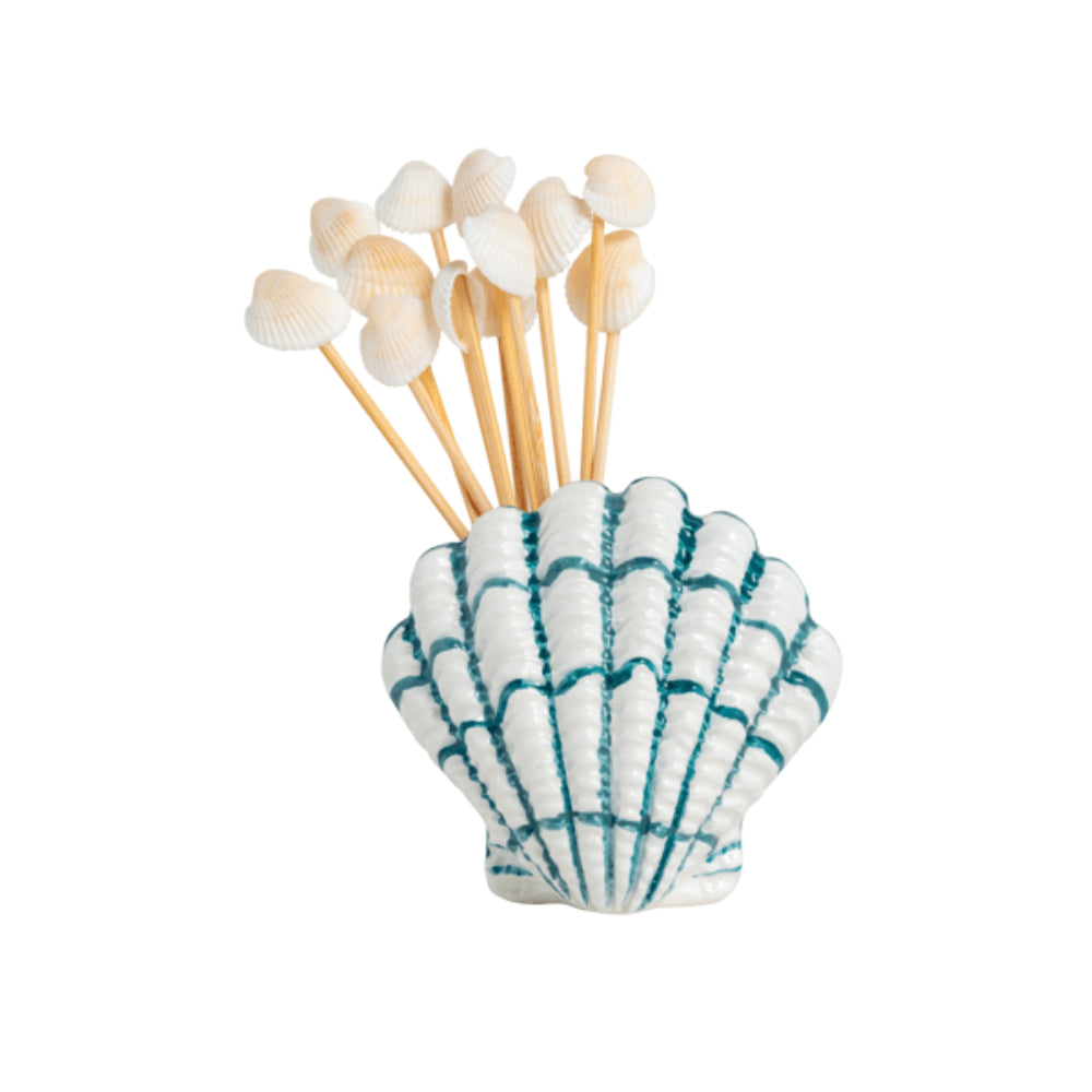 Shell-shaped holder with toothpicks on a white background