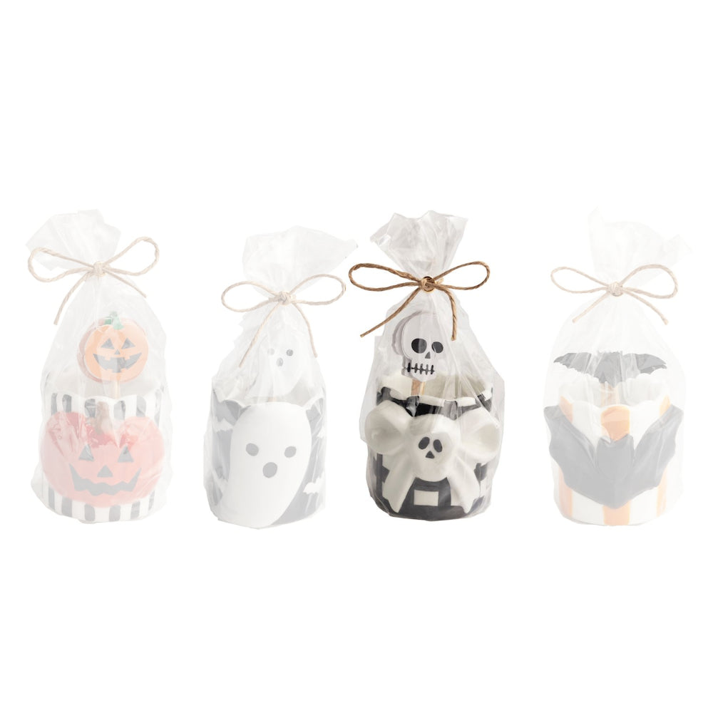 Skeleton halloween-themed toothpick caddy set with a black & white ceramic holder with a white skull on the front with skeleton toped tooth picks on a white backround. 