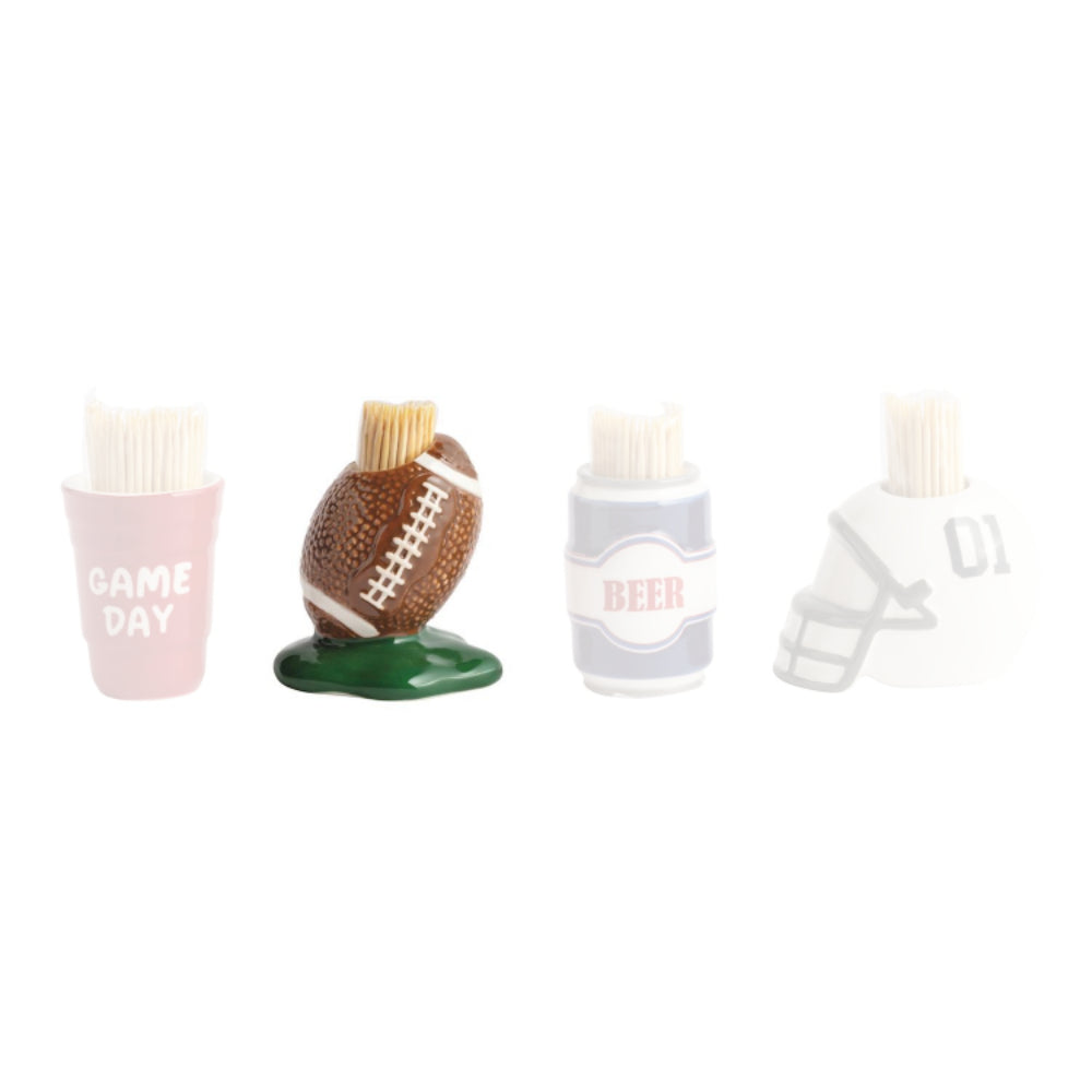 Ceramic Football tailgate themed  toothpick holder with a brown football with a green base and  toothpicks on a white background. 