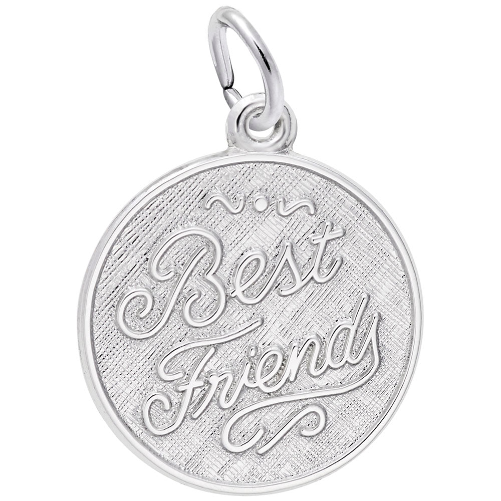 Silver disc charm with 'Best Friends' engraved on it on a white background