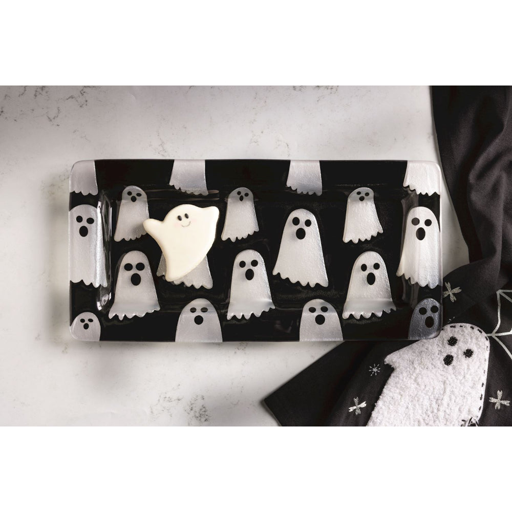 Halloween-themed tray with ghost design on a white surface