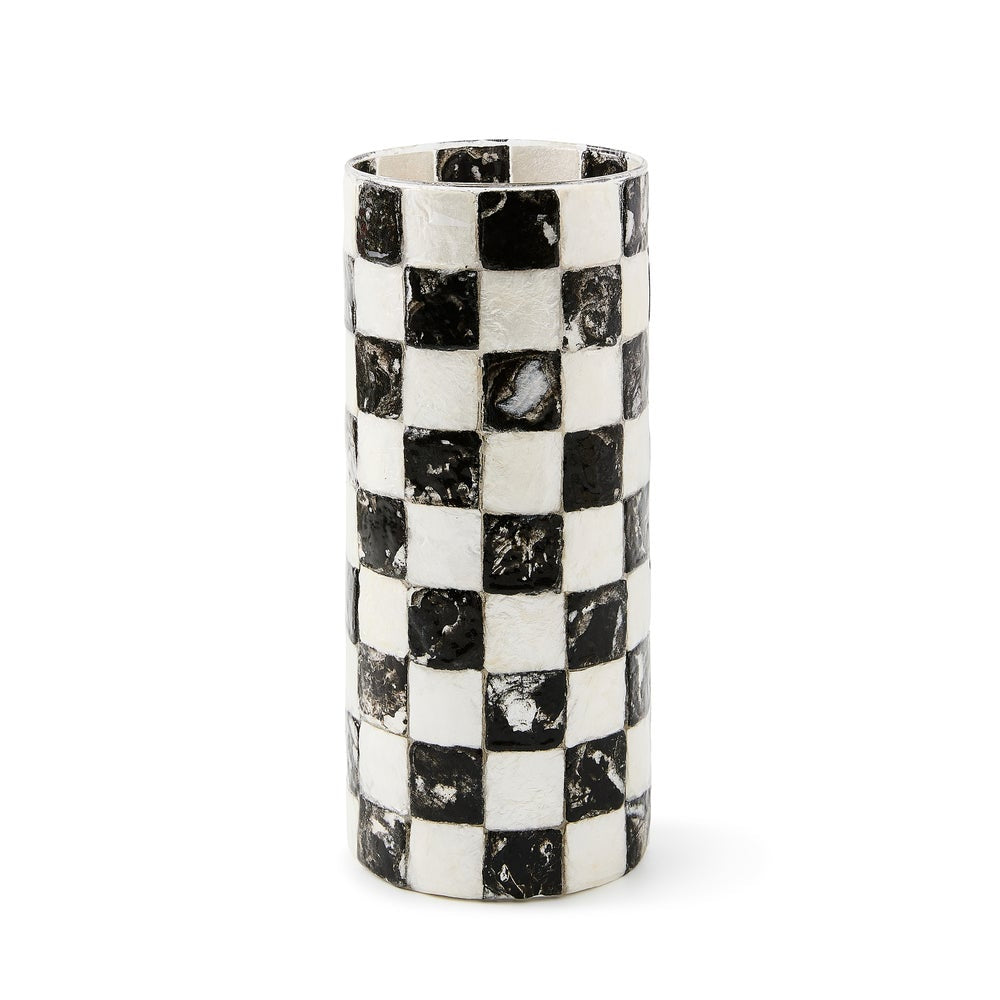 Cylindrical glass vase with black and white checkered pattern on a white background.