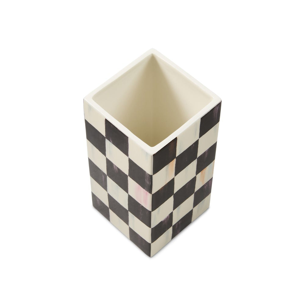 A square ceramic or stone container with a black and off-white checkerboard pattern, shown from an elevated perspective on a white background.