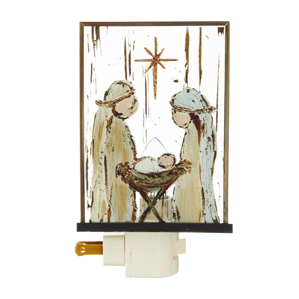 Decorative night light with a nativity scene design on a white background