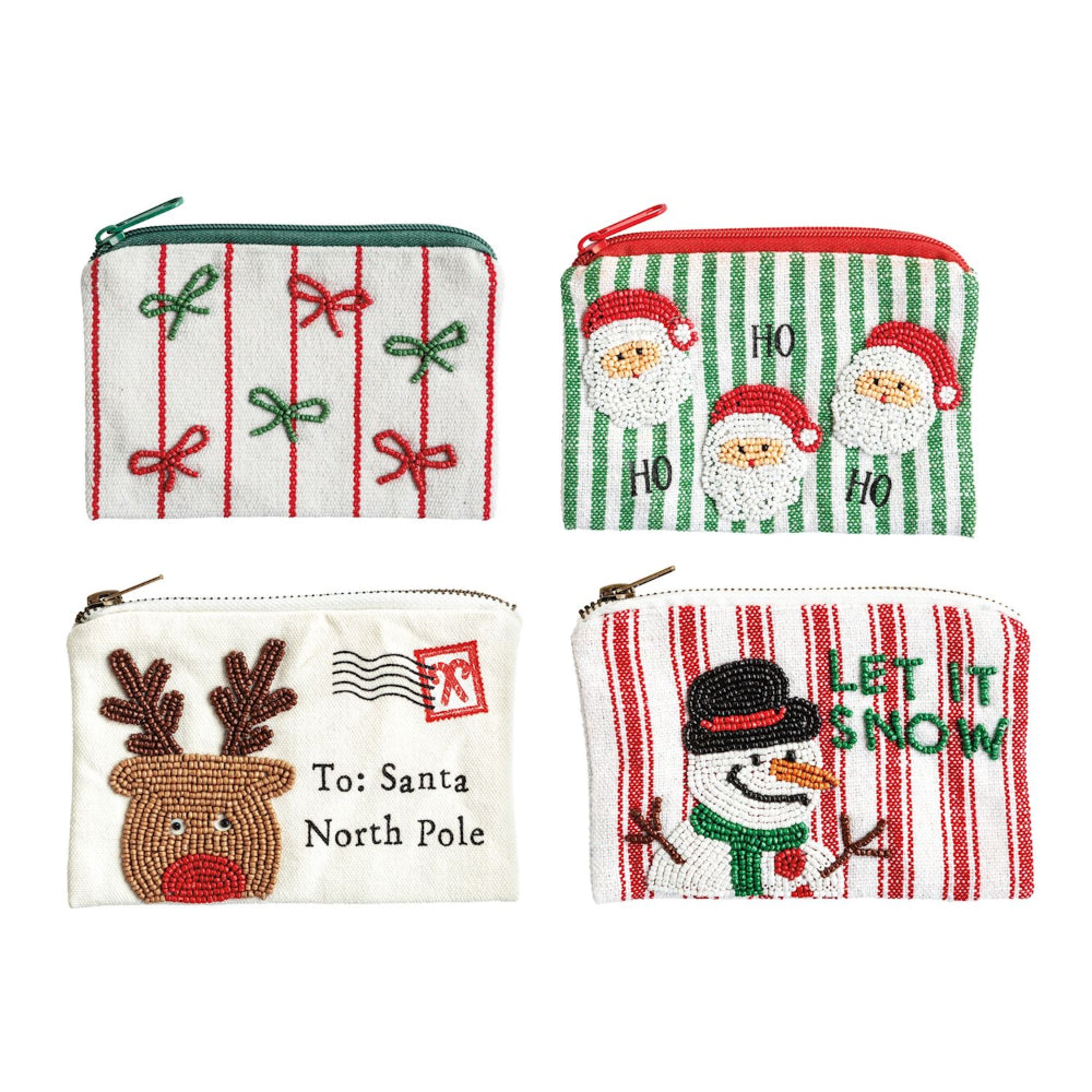 Four Christmas-themed coin purses on a white background