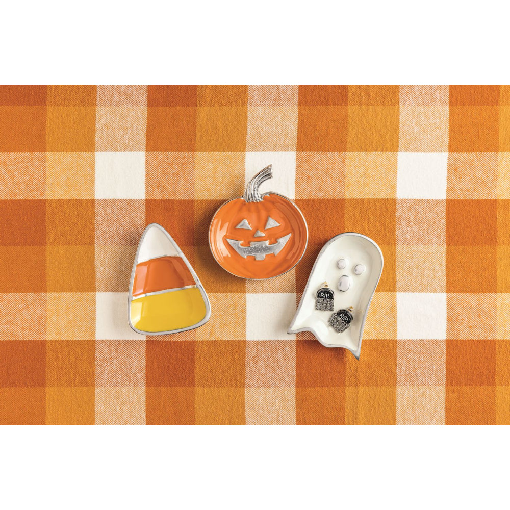 Three Halloween-themed trays of a Candy Corn, Ghost & Jack-O-Lantern on a checkered orange and white background.