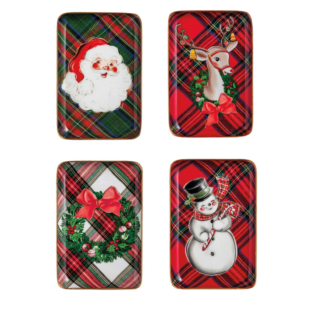 Four rectangular Christmas-themed trays with Santa, reindeer, wreath, and snowman designs on a white background.