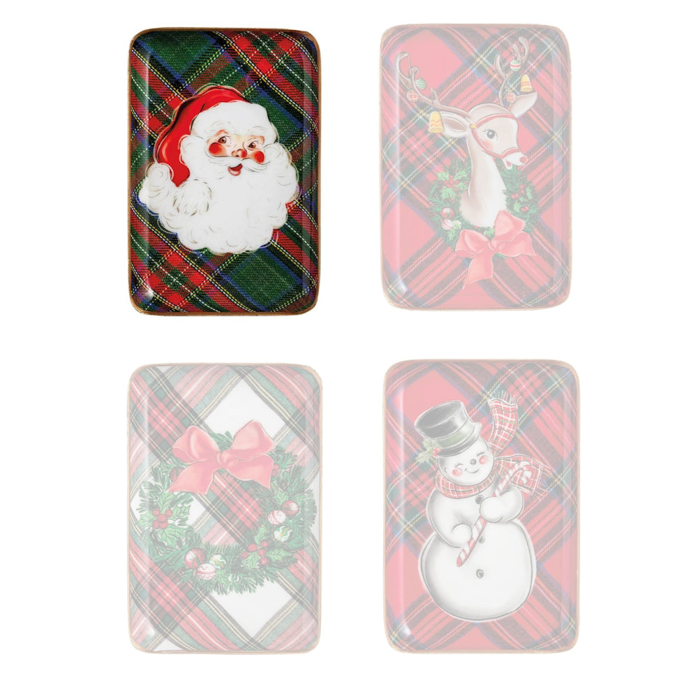 Four Christmas-themed tins with Santa, reindeer, wreath, and snowman designs on a white background.