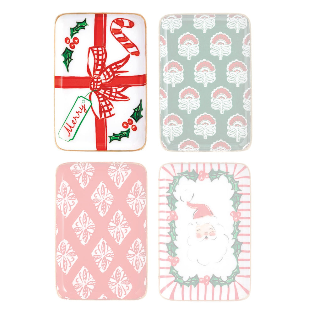 Four Christmas-themed plates with different patterns on a white background.