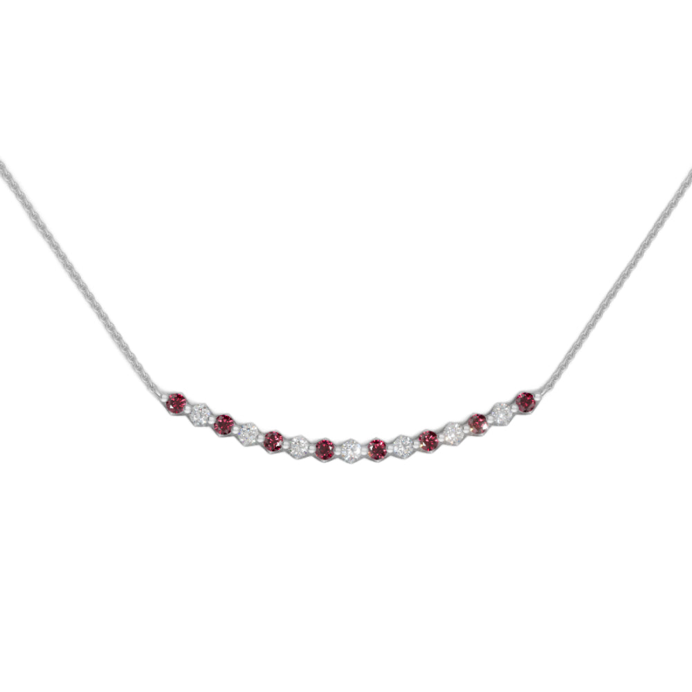 White gold garnet and diamond smile pendant necklace with small diamonds on a white background