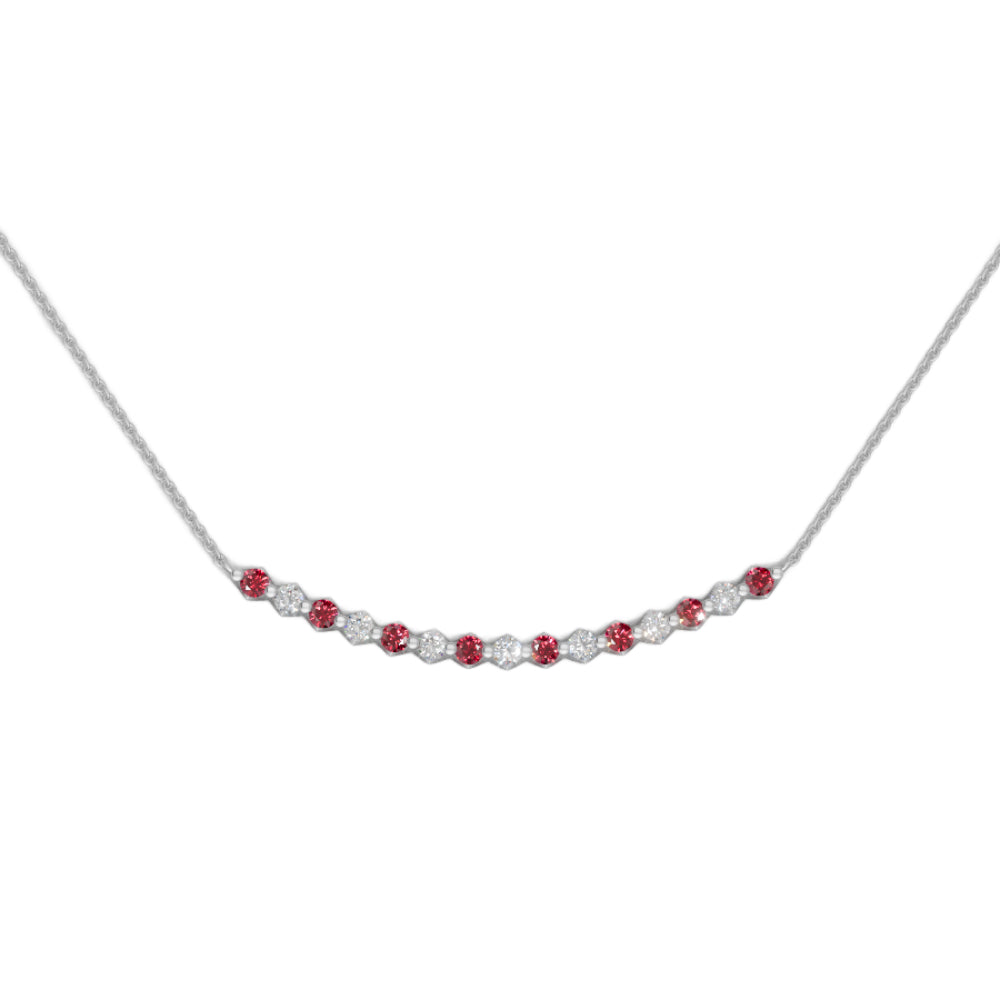 White gold ruby and diamond smile pendant necklace with small diamonds on a white background