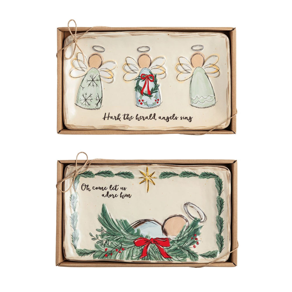 Two Christmas-themed TRAYS  in packaging with angel designs and text.